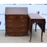 Mahogany drop leaf table and bureau .