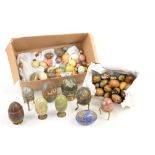 Marble and onyx eggs, some cloisonne, brass, wooden 'russian doll' style and other eggs.