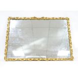 Gilt-gesso framed mirror.