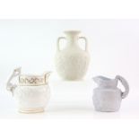 Parian ware vase in the style of the Portland vase, and nine various stoneware jugs including