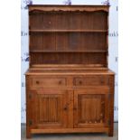 Oak dresser with three tier plate rack.