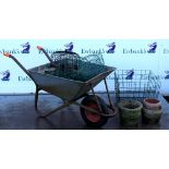 Collection of garden items to include two composite stone garden pots, wheel barrow, step ladder,