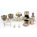 Group of silver items including condiments, a tea-strainer, dressing table box, compact, knife-