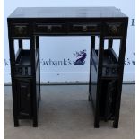 Chinese kneehole desk with four drawers open sections and cupboards, on square supports, 85cm x 79cm