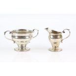 Silver creamer and sugar bowl, by JHW, Birmingham 1910.