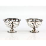 Boxed pair of silver pedestal dishes, with pierced sides, by ESB, Birmingham 1919.