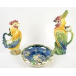 St Clement French majolica jug in the form of a cockerel, another a parrot, and a Grimwades lustre