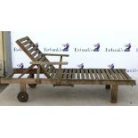 Teak garden lounger and two folding garden chairs.