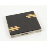 White metal and tortoiseshell cigarette case with engine turned decoration, 8cm wide,.