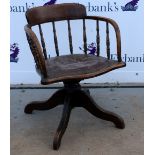 Early 20th century oak desk chair .