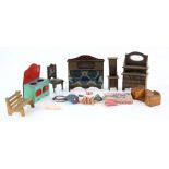 Collection of dolls house furniture and accessories .