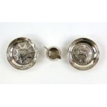 Two continental silver 830 grade dishes one with antelope designs the other floral and an 800