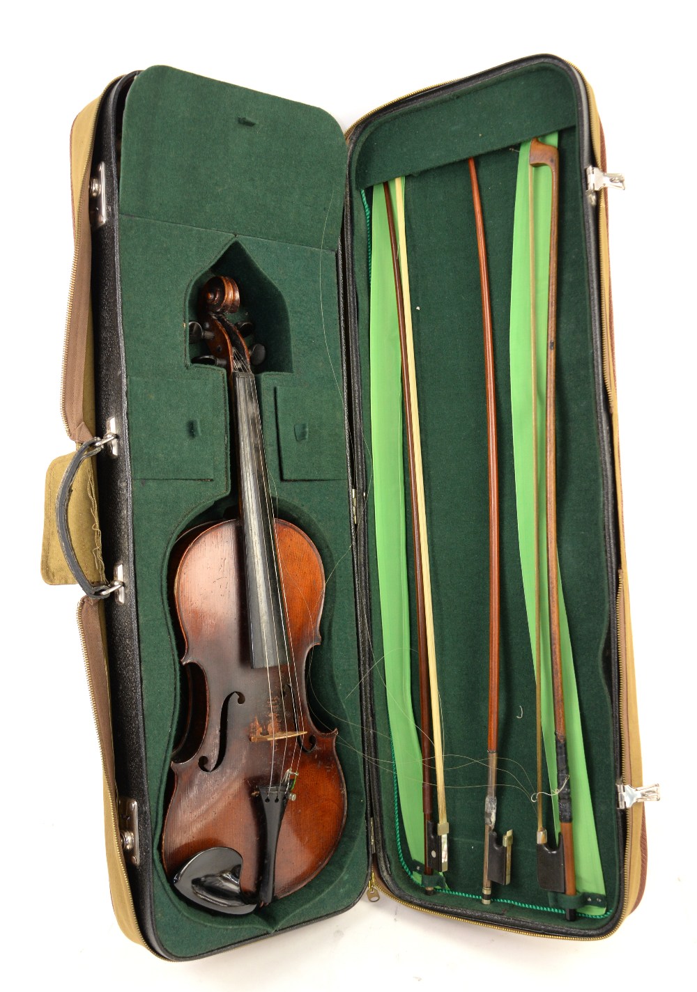 Violin in case, with three bows, the violin with copy of Antonius Stradavarius label within.