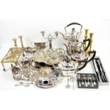 Large quantity of silver-plate and metalware including flatware, tea service, candlestick, etc.