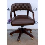 Modern leather mahogany office chair.