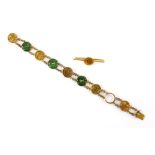 Chinese bracelet, set with round disks of jade and gold characters, connected with belcher link