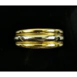 Christofle Paris dress ring, consisting of three rows in both white and yellow gold, inside band