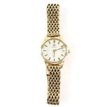 Omega A Ladies Reference BL 711 5507 gold dress watch,the silver coloured dial with baton hour