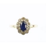 1930's sapphire and diamond ring, oval cut sapphire surrounded by Swiss cut diamonds, mounted in