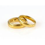 Two plain gold wedding bands, 22 ct ring sizes K & M . CONDITIONGood conditionGross weight 14.6