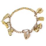 Gold charm bracelet, with curb links and five seed pearl and turquoise set links, heart padlock