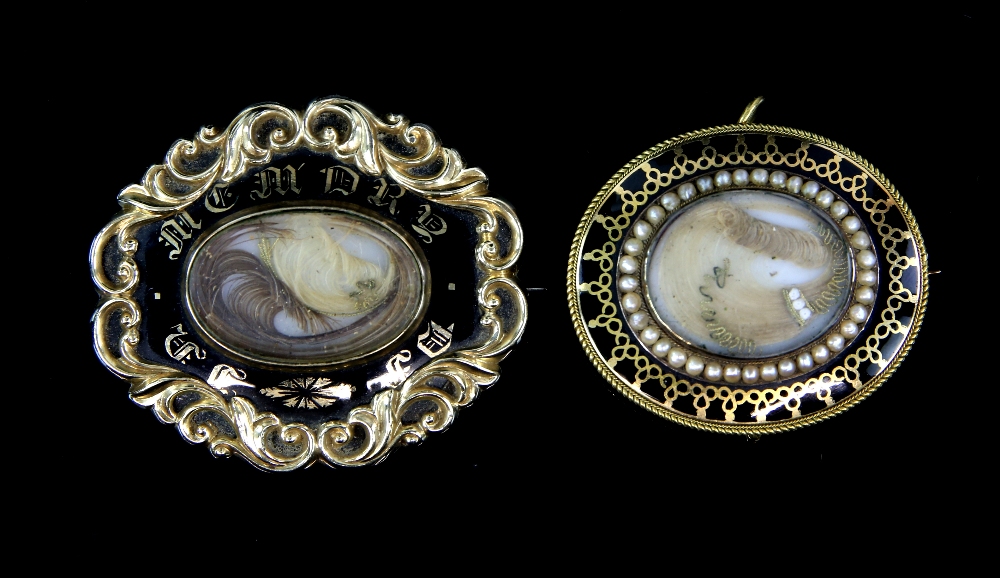 Two Victorian black enamel mourning brooches, one central hair panel surrounded by a fresh water - Image 2 of 4