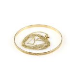 Gold circular bangle, textured detail, testing as 9 ct and a flat curb chain stamped 14 ct, bolt