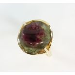 Modern rough cut watermelon tourmaline, mounted in 14 ct yellow gold, ring size O. CONDITION14 ct