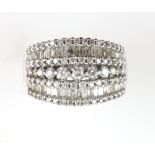 Diamond dress ring set with brilliant and baguette cut diamonds, total diamond weight estimated at