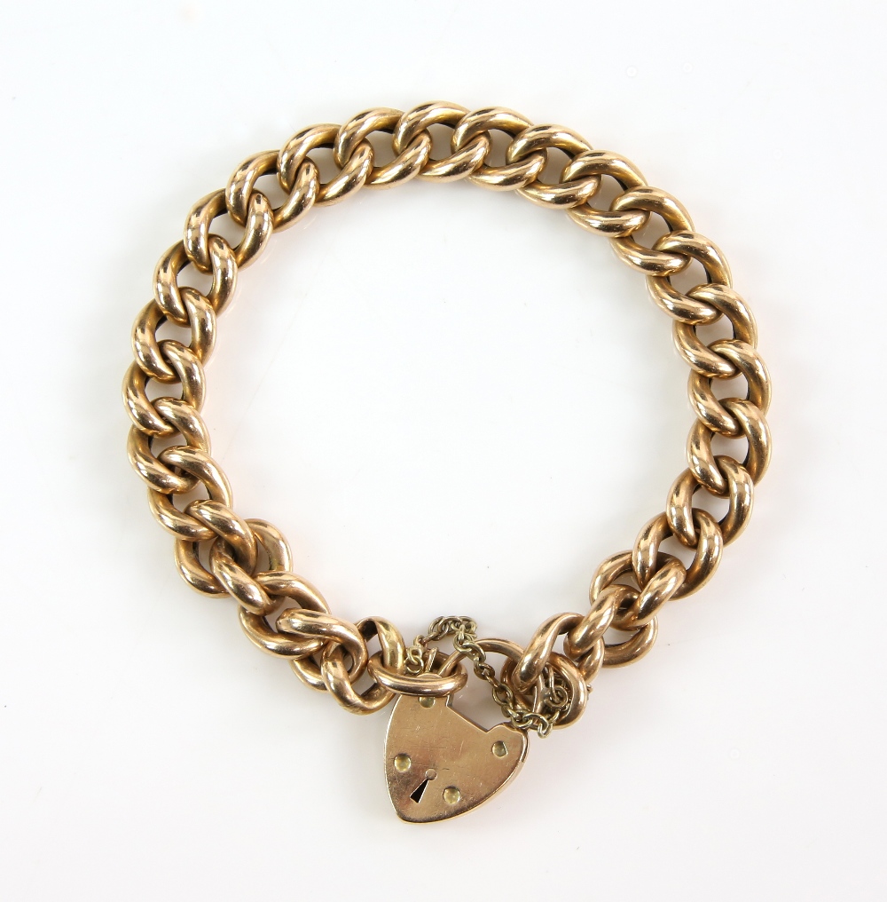 Victorian curb link bracelet, heart padlock clasp, in unmarked gold stamped 15 ct . CONDITION15 ct