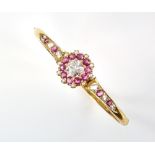 Indian oval gold hinged bangle, set with round cut pink and white sapphires and seed pearls,