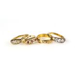 Marquise form ruby and diamond ring, and similar diamond ring, gold buckle ring all 18 ct and an