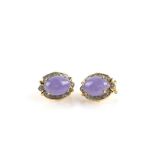 Lavender jade earrings, with oval cabochon stones with surround of small diamonds, 14 ct gold,