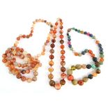 Three gem stone bead necklaces, two graduated agate necklaces, both strung with knots, with bolt