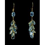 Blue topaz drop earrings; oval faceted blue topaz collet set in a 'grape' style setting, 4.5cm drop,