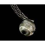 Gold textured ball locket pendant, opens and folds out to four round photograph spaces, with two