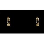 A pair of earrings, set with oval cut sapphires and round brilliant cut diamonds with post and