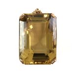 Large rectangular step-cut Citrine pendant, four-claw set, marked for 9 ct gold.