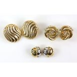 A pair of 18 ct gold knot earrings, a large oval pair of 14 ct earrings with wave detail and pair of