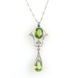 Black Starr & Frost, early 20th C pendant, set with central oval cut peridot, estimated weight 3.