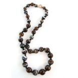 A banded agate bead necklace strung with knots to a bolt ring clasp,length 40 cm . CONDITION, a