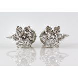 Cartier diamond cluster earrings, set with round brilliant cut diamonds, estimated total diamond