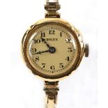 1920's Rolex wrist watch, cream dial with Arabic numerals, minute track, Rolex signed 15 rubies
