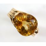 Contemporary cocktail ring, set with a pear cut citrine, estimated weight 8.80 carats, mounted