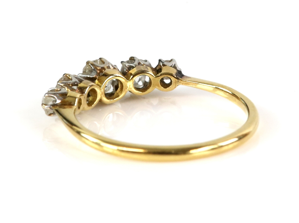 Edwardian ring set with five old cut diamonds, centre stone estimated as 0.30 carat, claw setting,in - Image 4 of 4