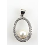 Contemporary white gold pearl and diamond pendant, loop form set with a single pearl of 9 mm and