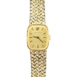 Girrard- Perregaux, A ladies silver gilt dress watch the signed brushed gold dial with baton hour