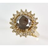 Grey diamond cluster ring; central brilliant cut charcoal diamond of approximately 2.00 carats,