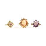 Three rings, one antique set with amethyst and rose cut diamonds, mounted in 15 ct, another set with