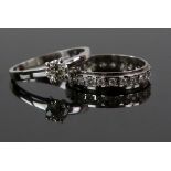 Two rings, one diamond solitaire, estimated total diamond weight 0.54 carats, ring size P, and a